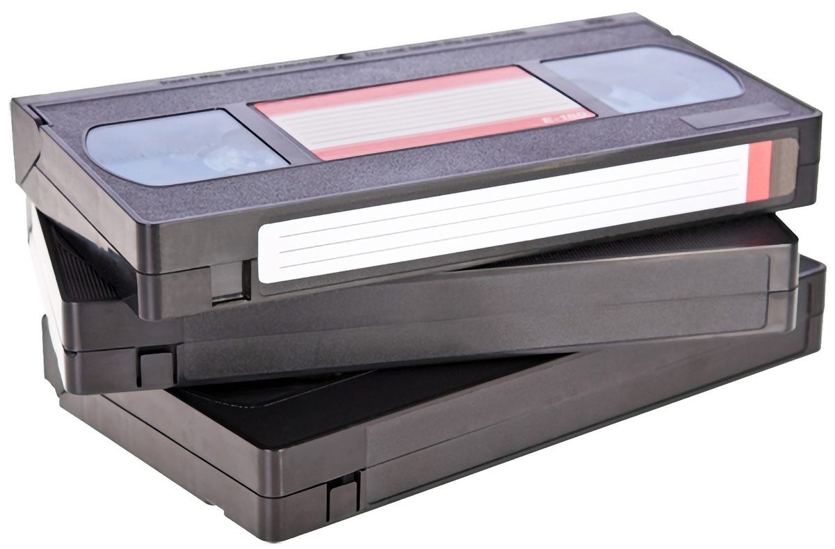 Stack of VHS cassettes ready for digital conversion